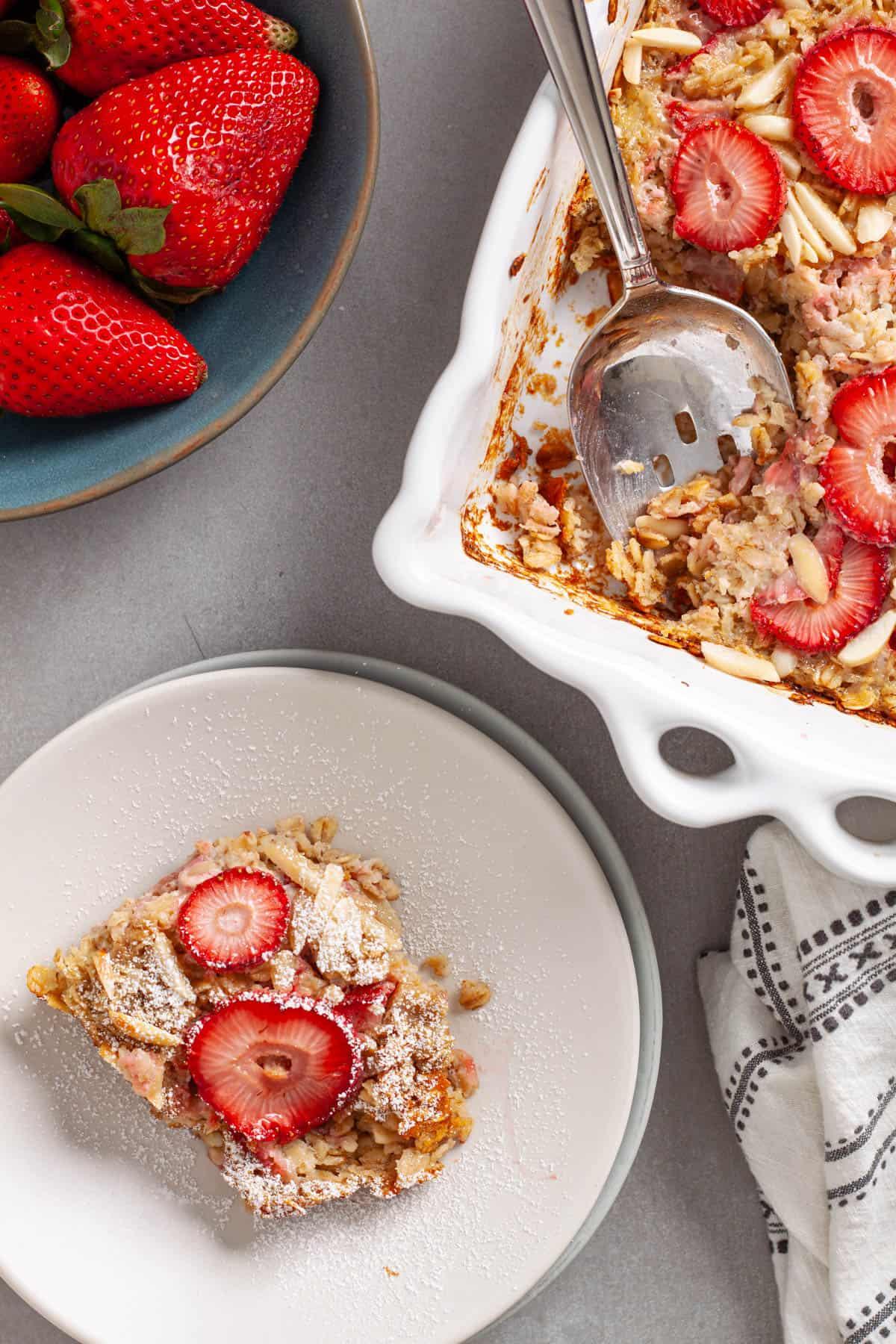 ingredients for almond butter strawberry oatmeal on a kitchen counter