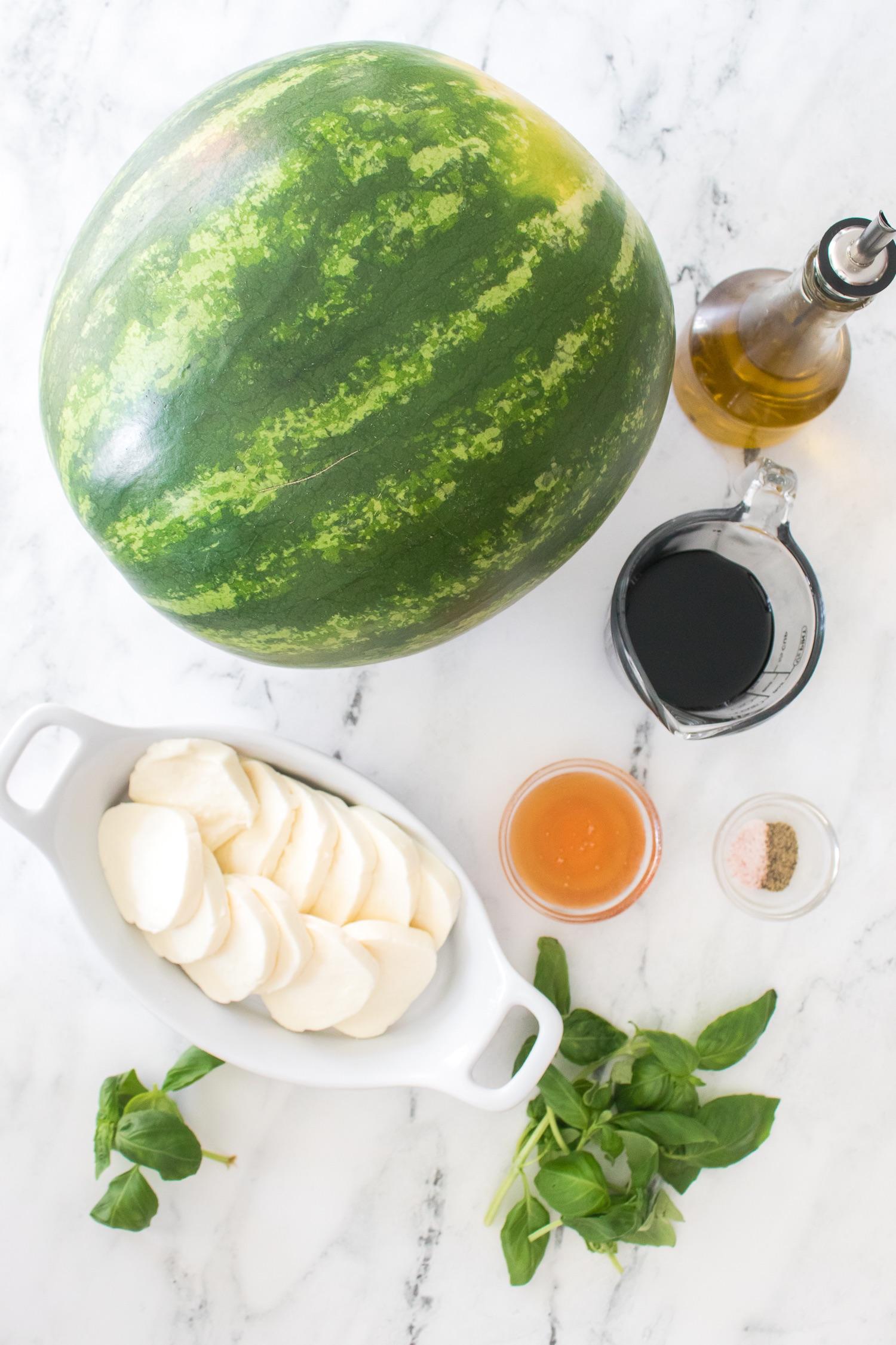 overhead shot of a bowl of watermelon basil mozzarella salad