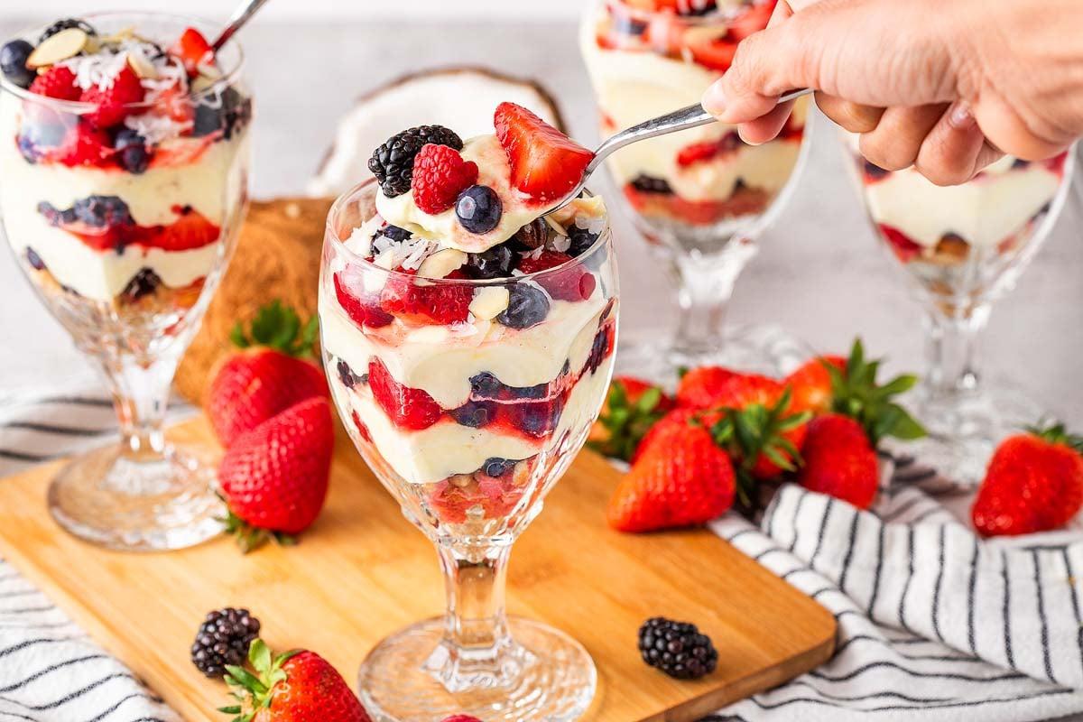 layered berry spelt parfait in a glass