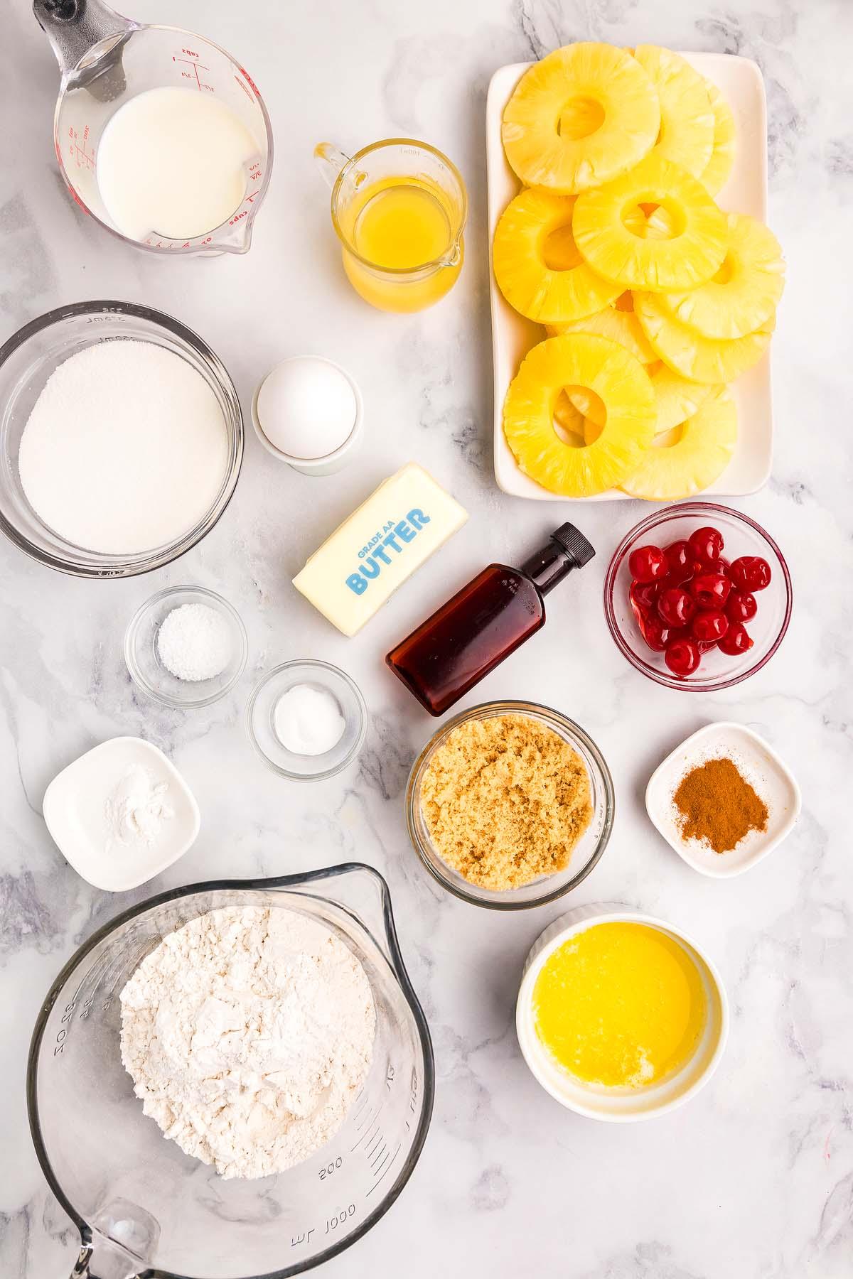 overhead shot of the ingredients needed for making the cheesecake, neatly arranged