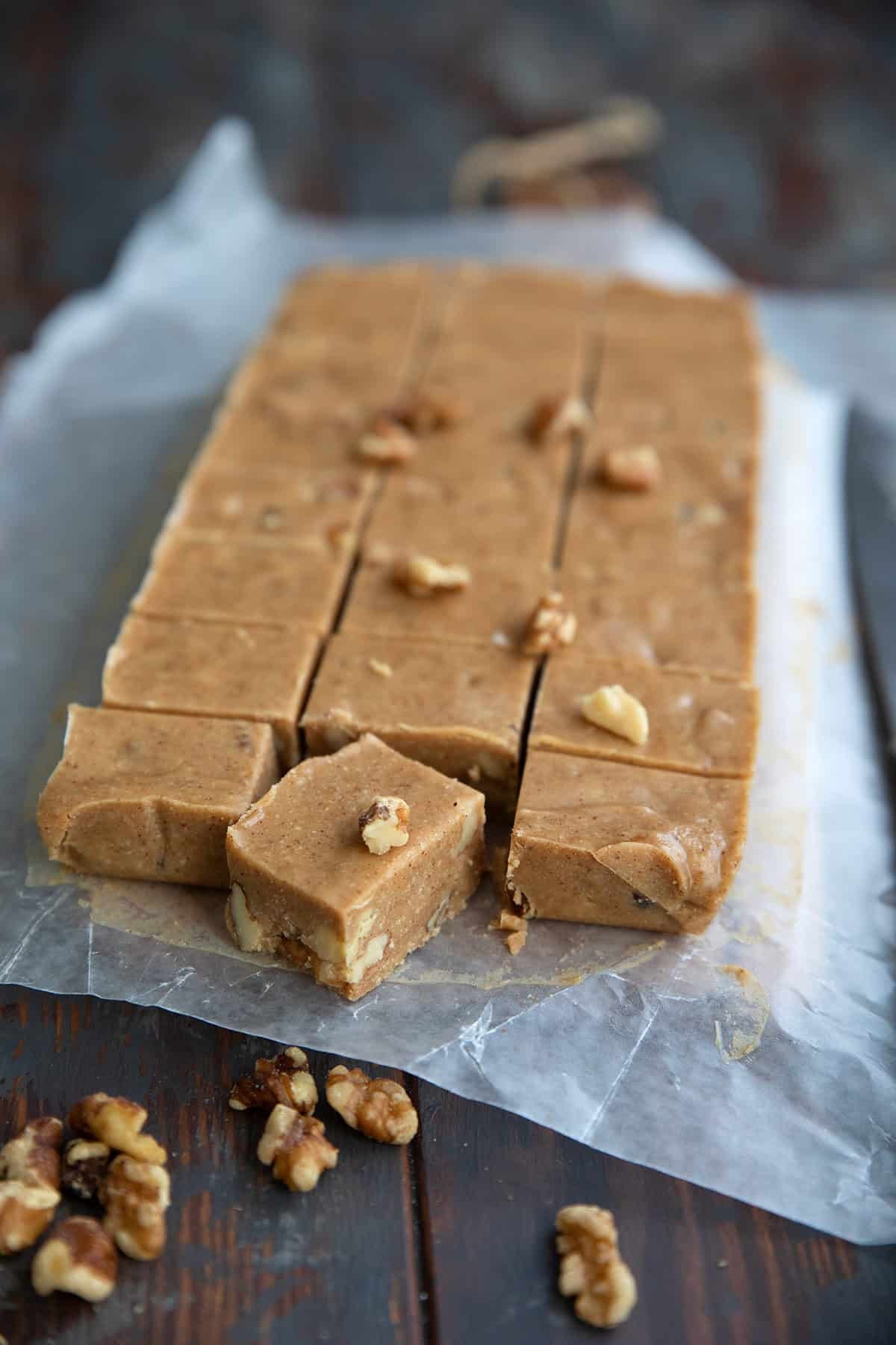 sugar-free maple walnut fudge on a wooden board