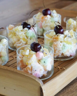 Rhubarb ambrosia with kiwi garnish in a glass bowl