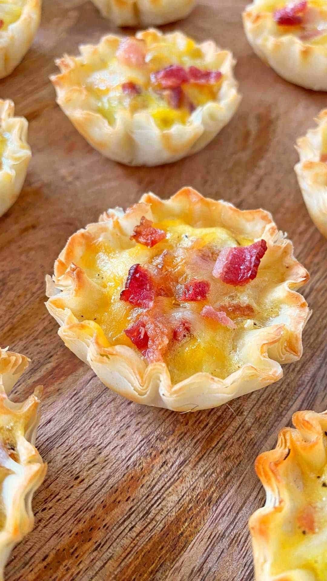 close up of mini quiche charcuterie board