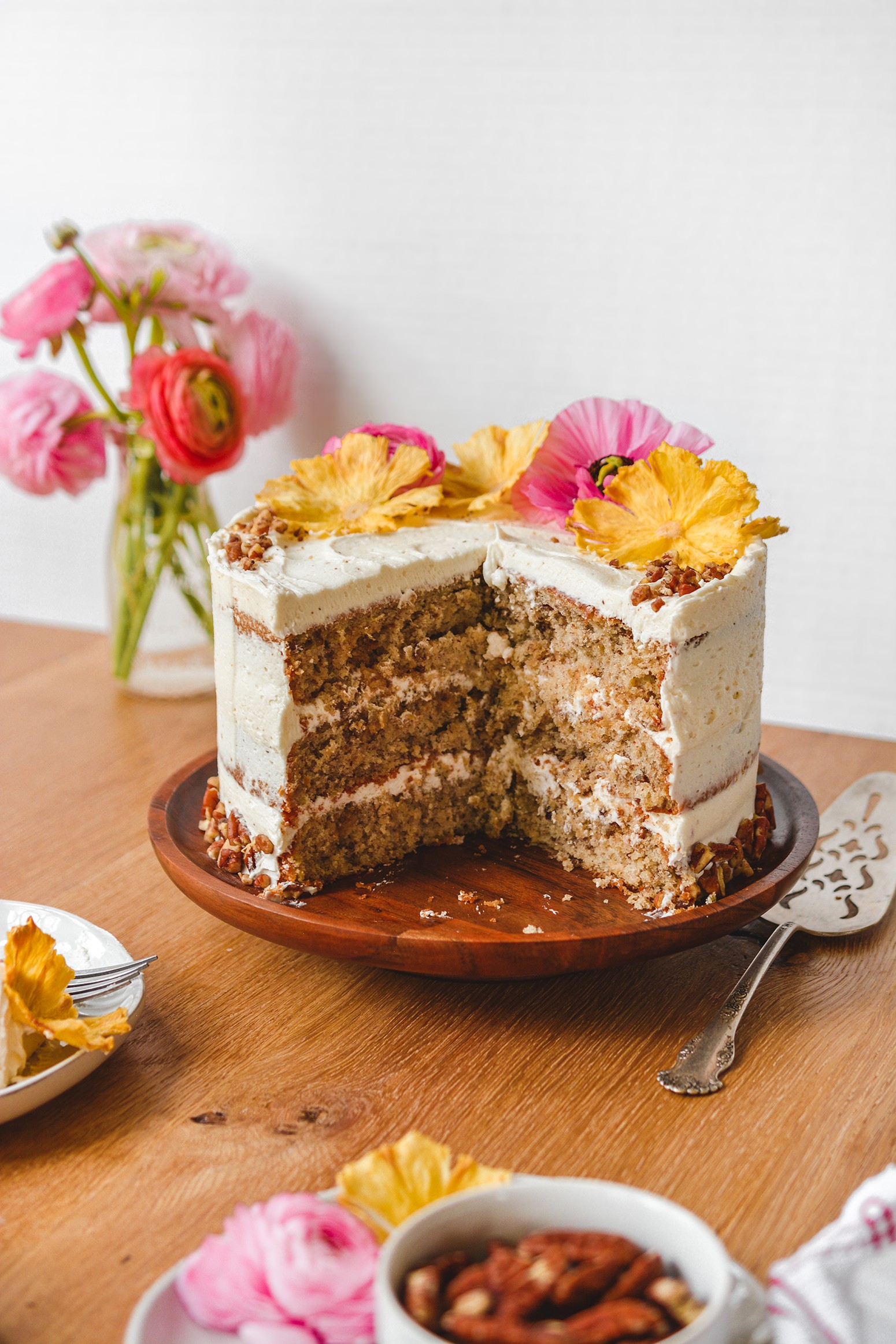 hummingbird cake decorated with boysenberries