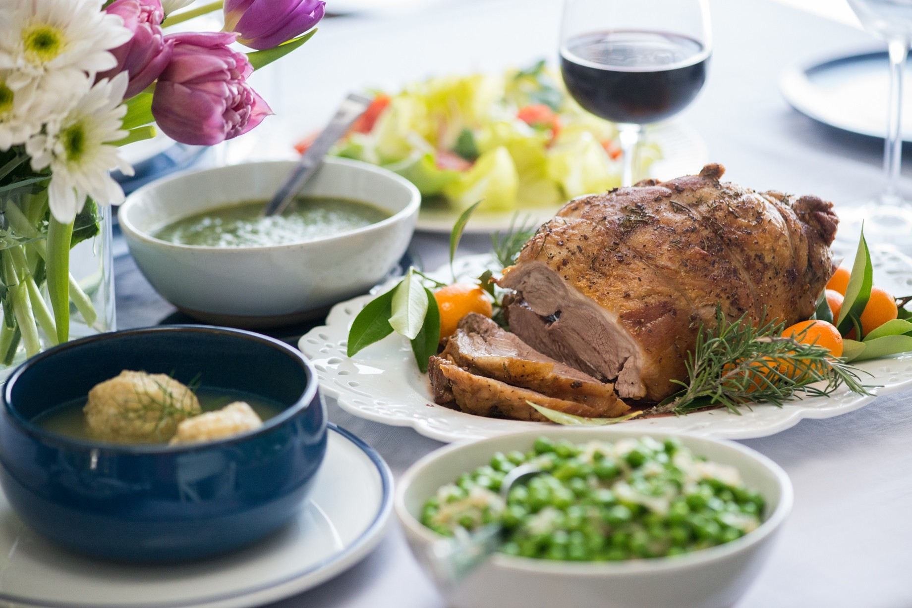 close up of roasted spring lamb with fresh mint pesto