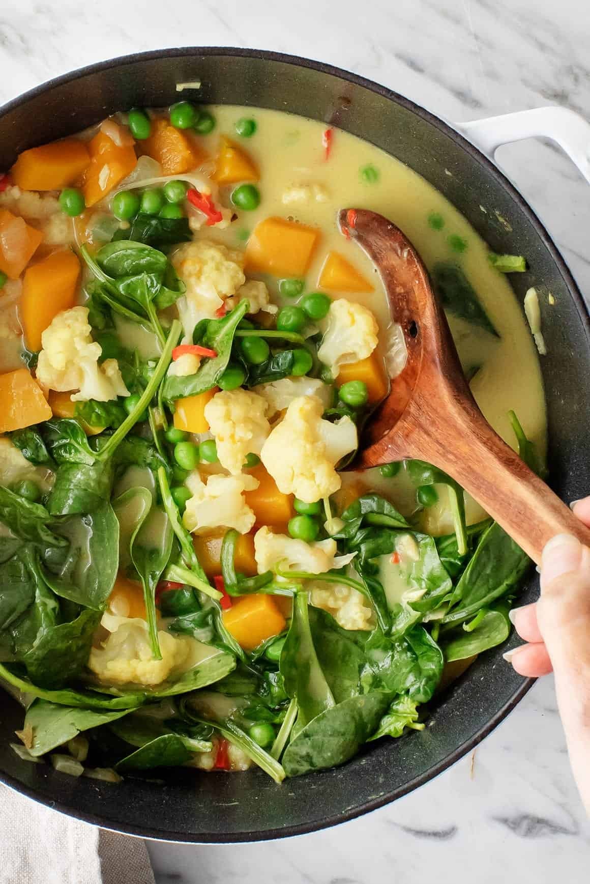 bowl of clean-eating vegetable curry with coconut milk