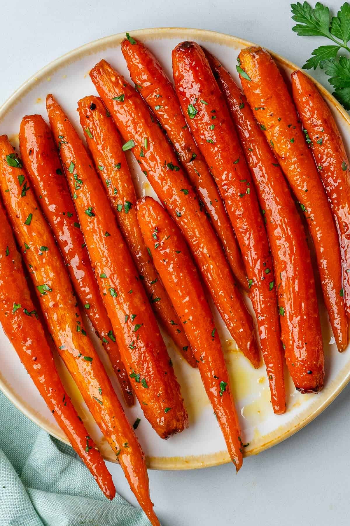 golden honey glazed carrots close-up with soft texture in a serving dish
