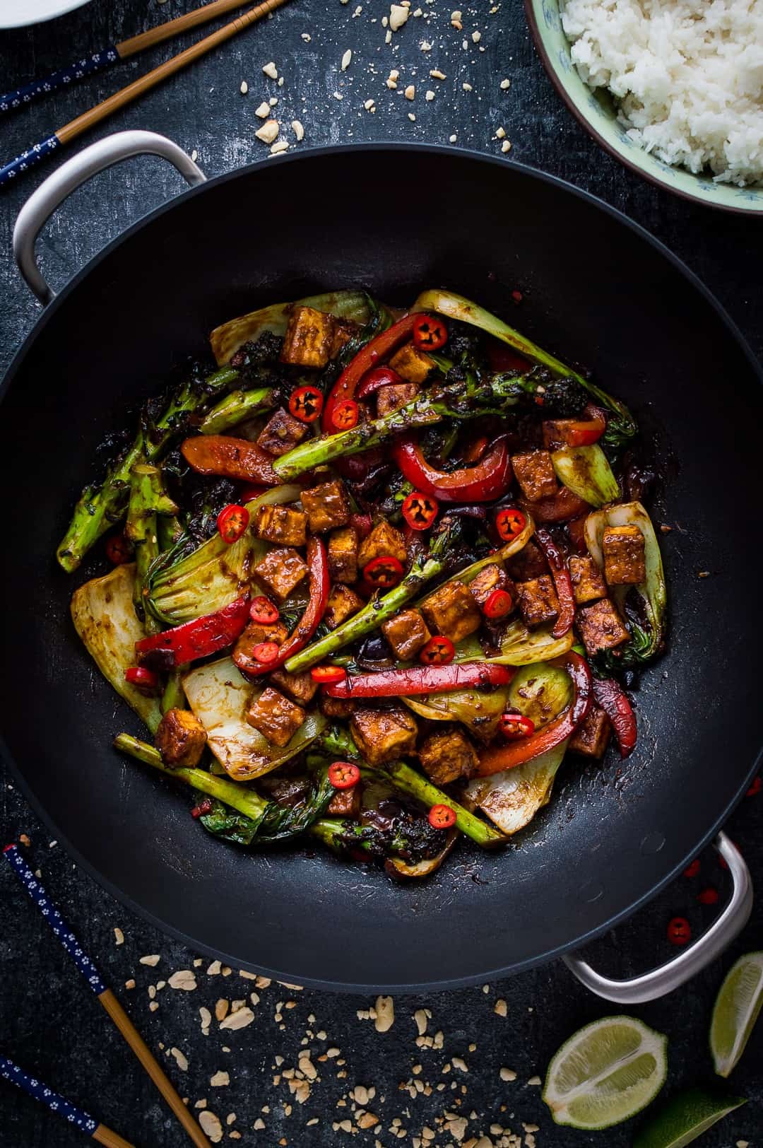 Spicy peanut tofu stir-fry in a wok