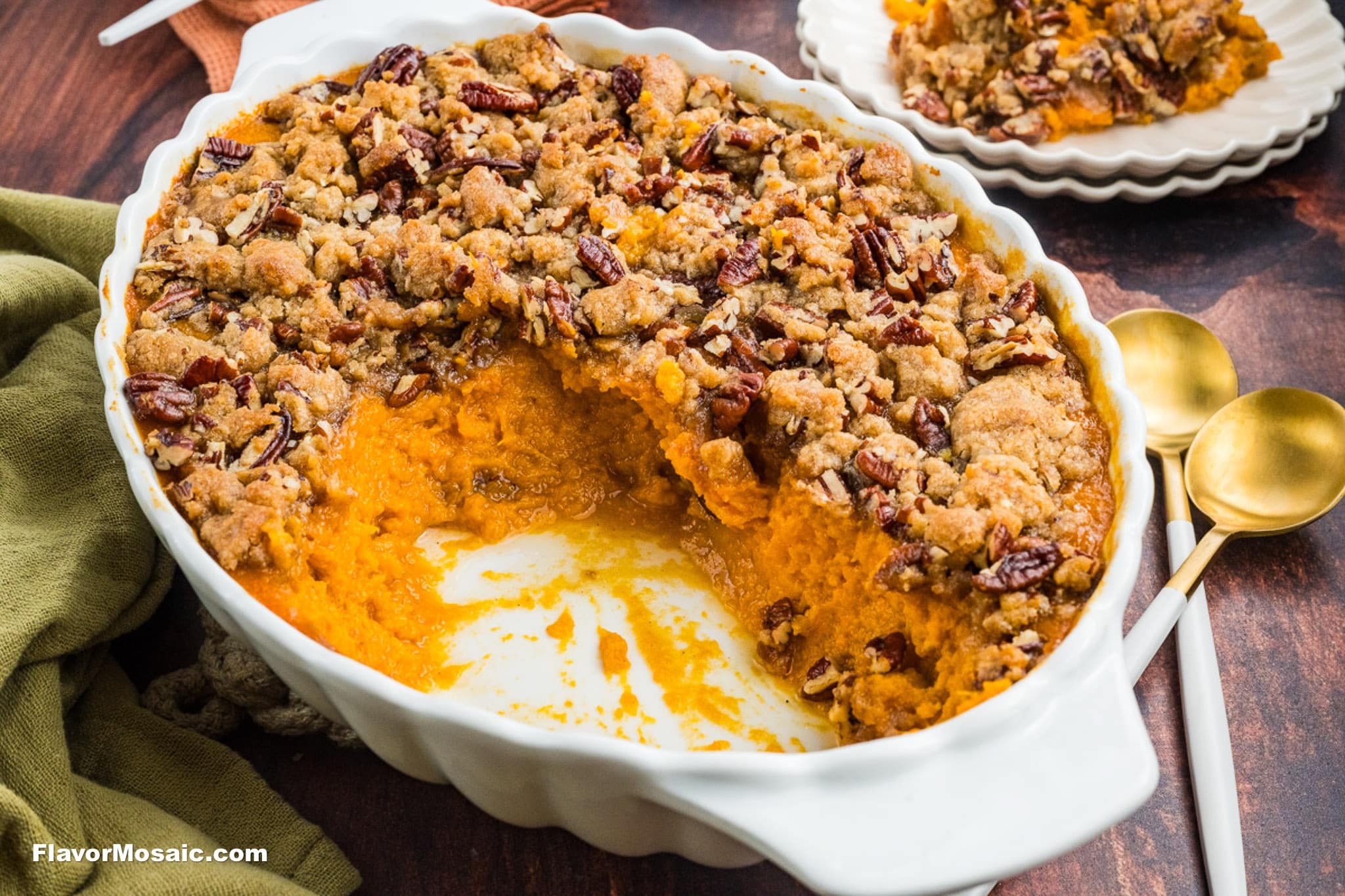 vibrant creamy sweet potato casserole with melted butter topping and pecans, golden brown, festive setting