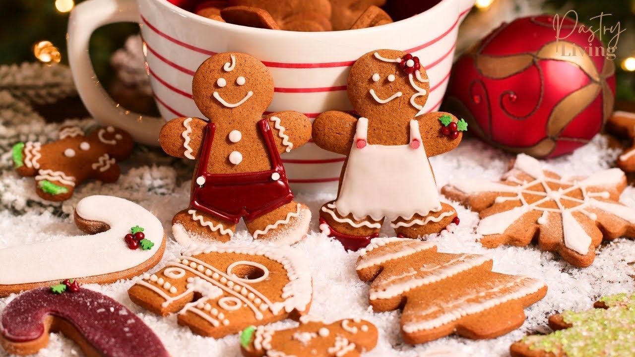 beautifully decorated gingerbread cookies with festive background, warm lighting