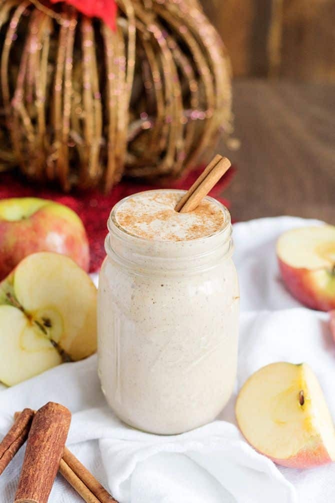 a steaming mug of spiced apple protein drink