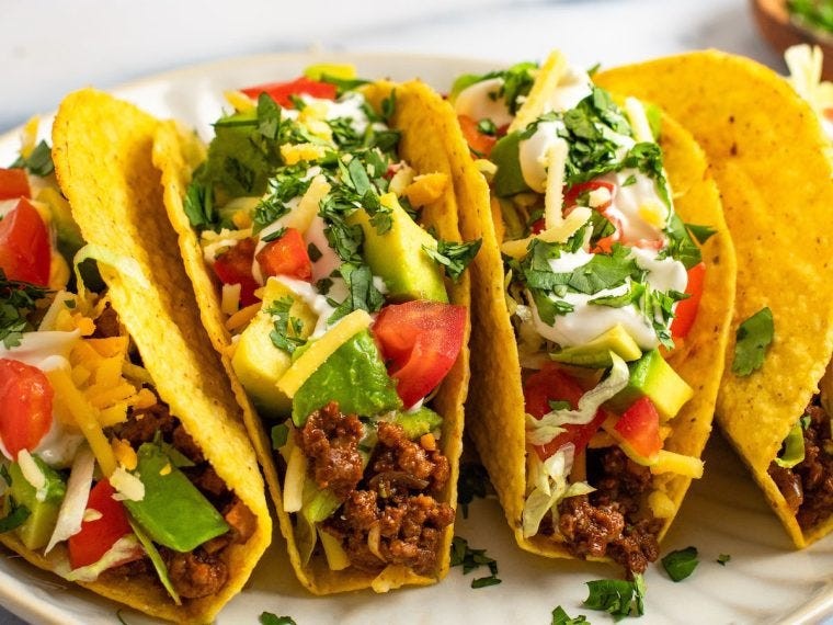 star anise infused ground beef tacos with vibrant toppings