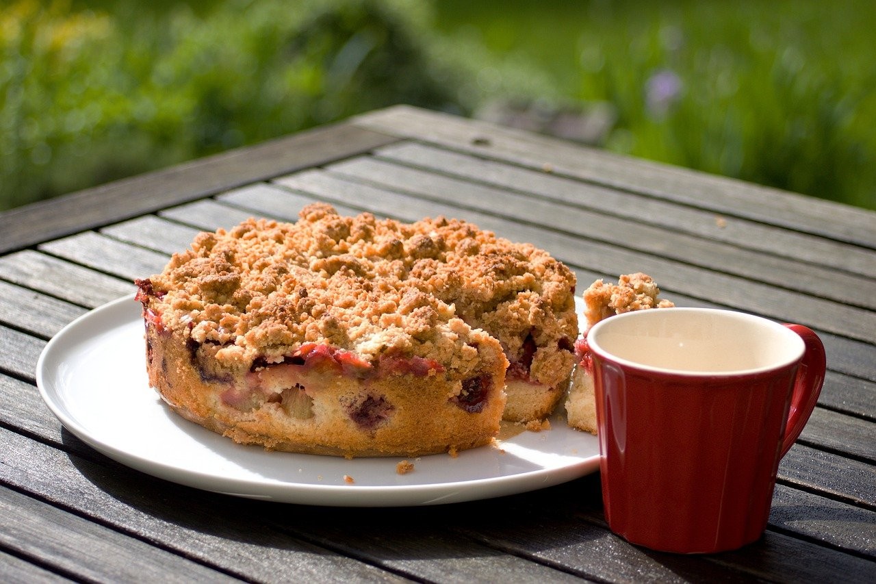 rhubarb sunflower seed cake on a wooden table