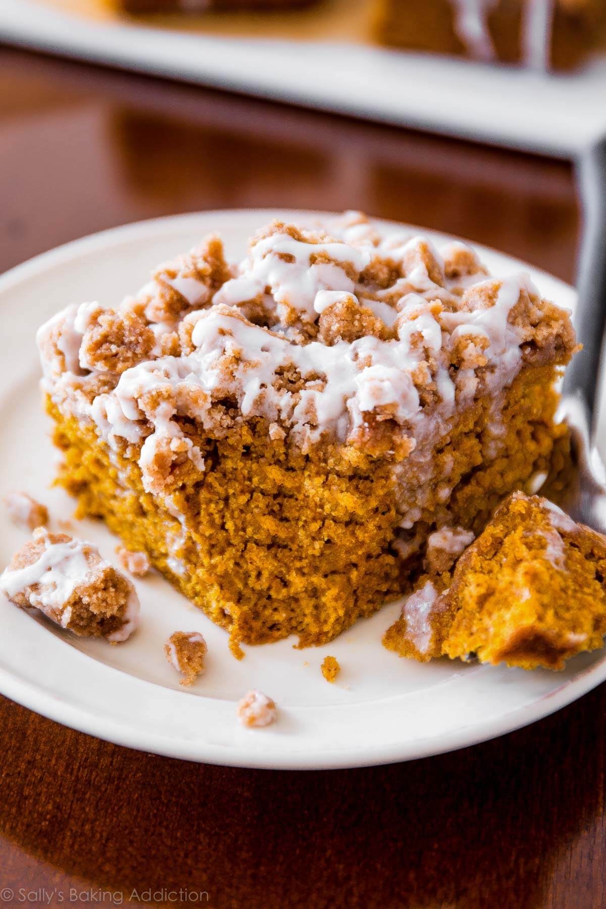 slice of pumpkin coffee cake with coffee