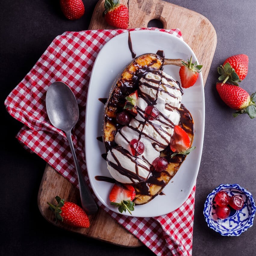 grilled banana splits with chocolate sauce and ice cream
