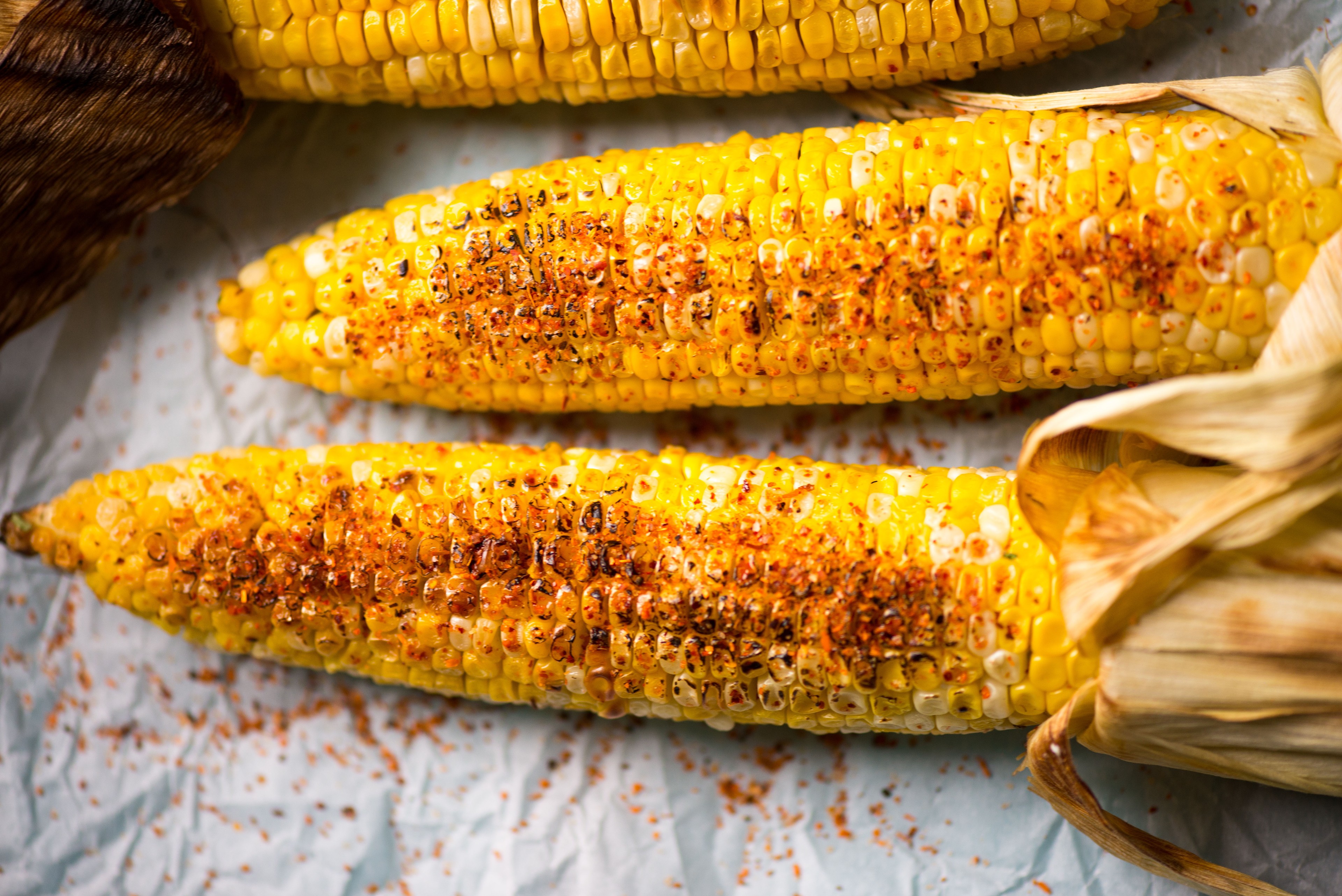 grilled corn on the cob with lime and Tajin seasoning