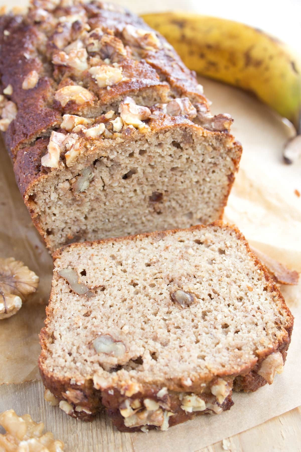 slice of sugar-free banana bread with bananas and walnuts