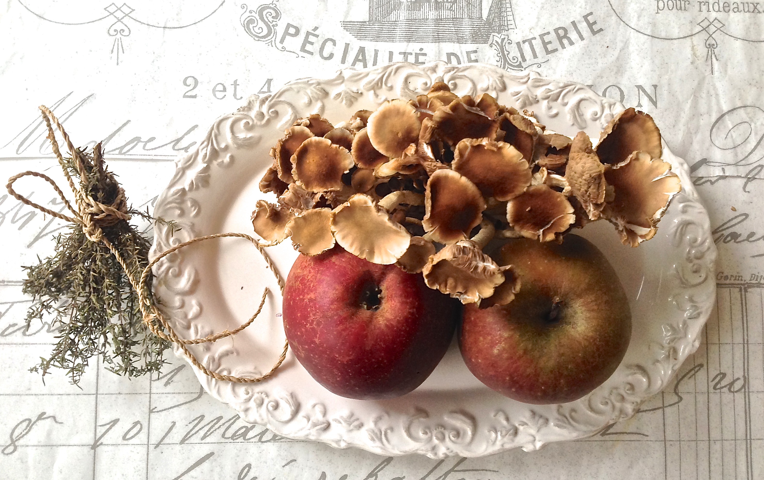mushroom truffle baked apples on a rustic wooden table