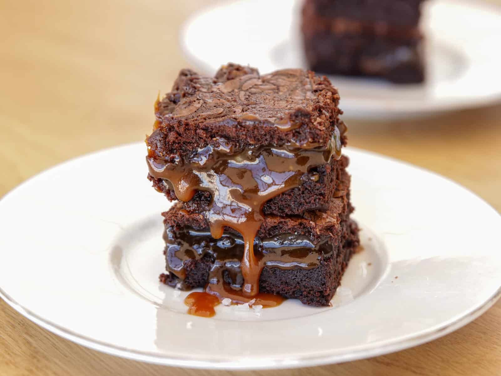 close up of salted caramel brownie bites on a plate