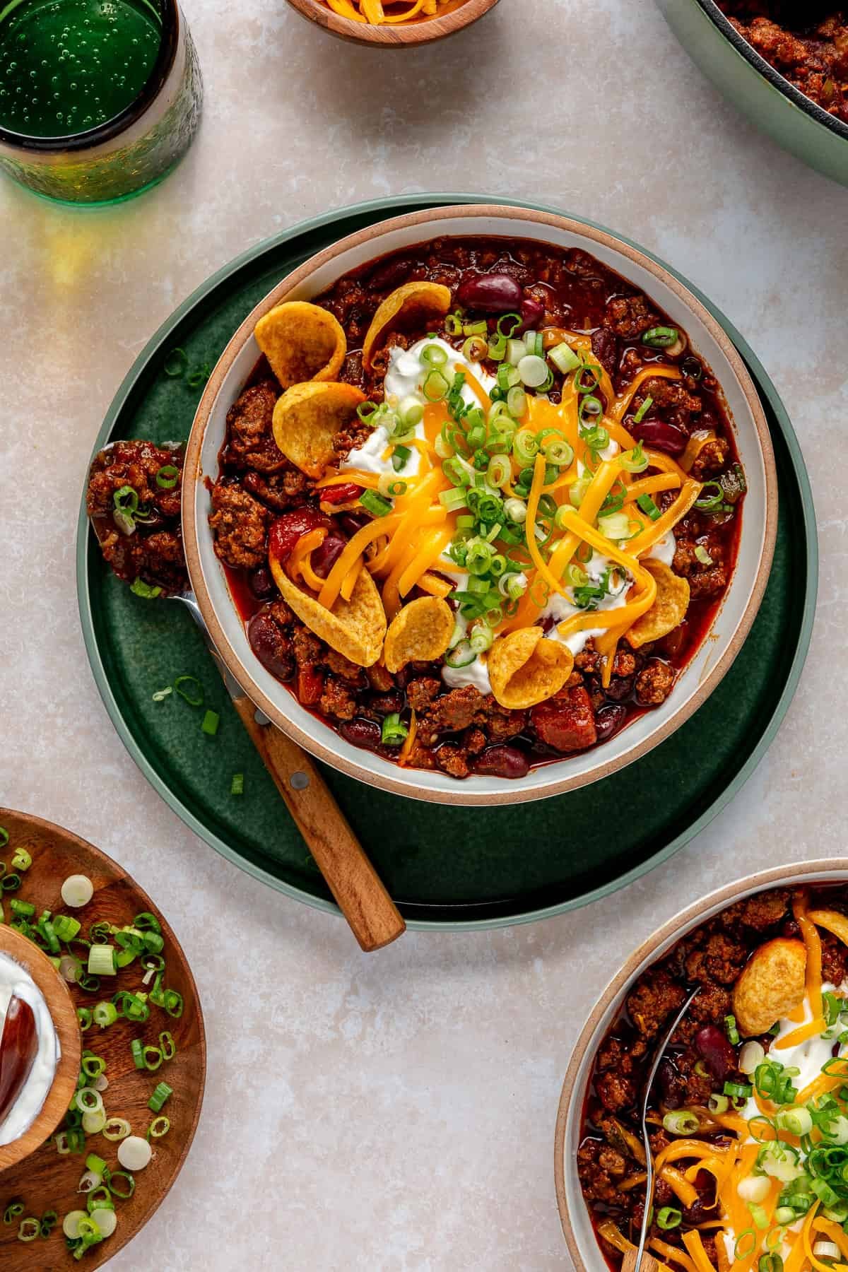 bowl of beef and bean chili with toppings