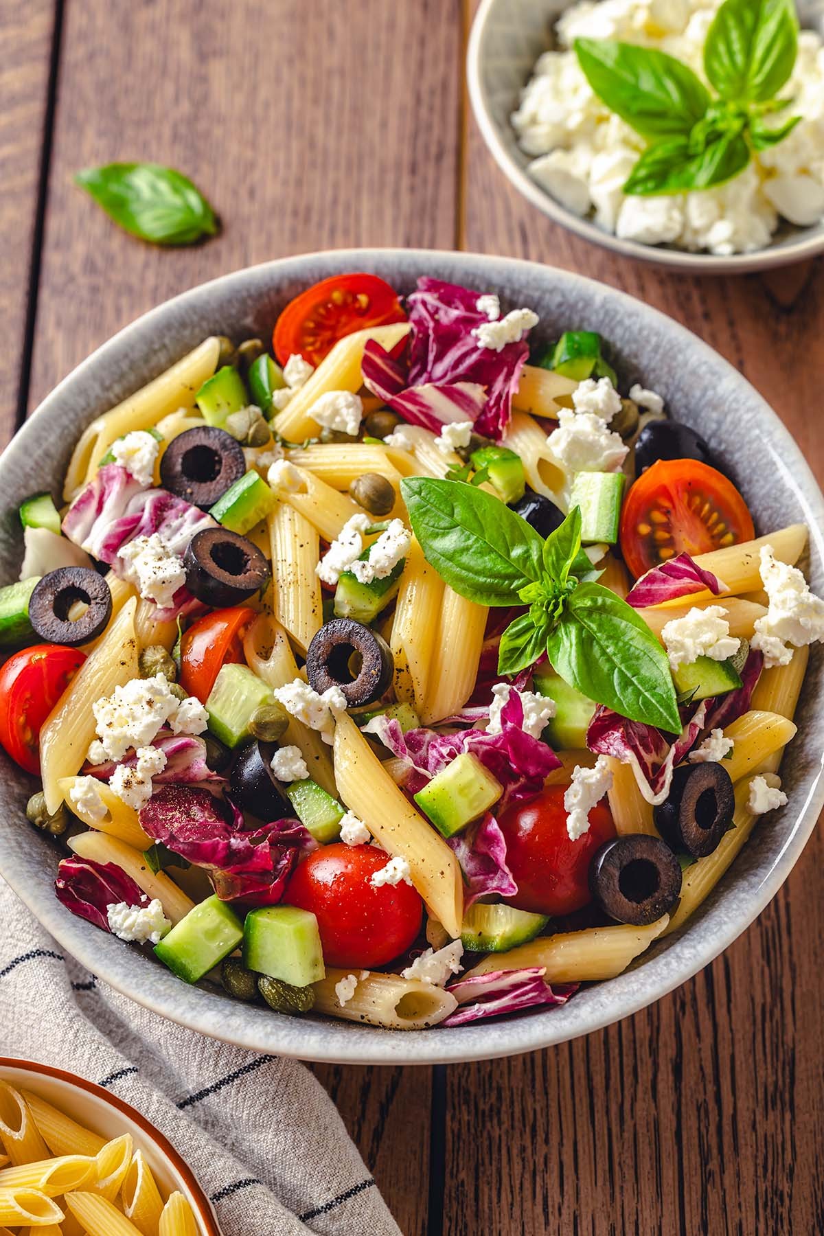 vibrant Sicilian pasta salad with sun-dried tomatoes and olives
