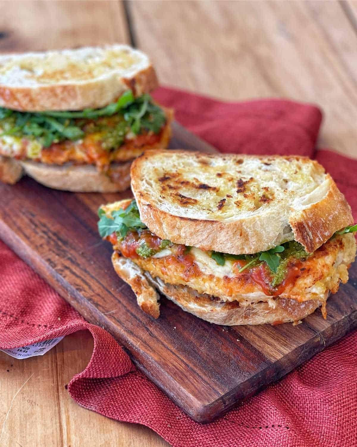 close up of a freshly made Chicken Parmesan Club Sandwich