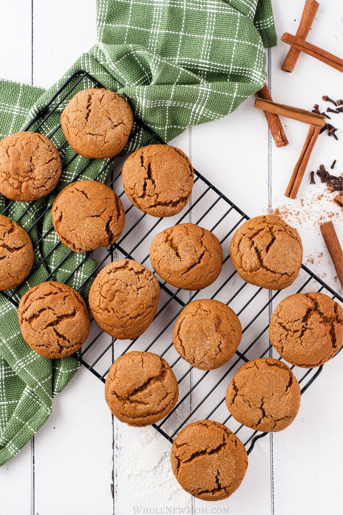 Warm iced ginger cookies on a cooling rack, cozy kitchen setting