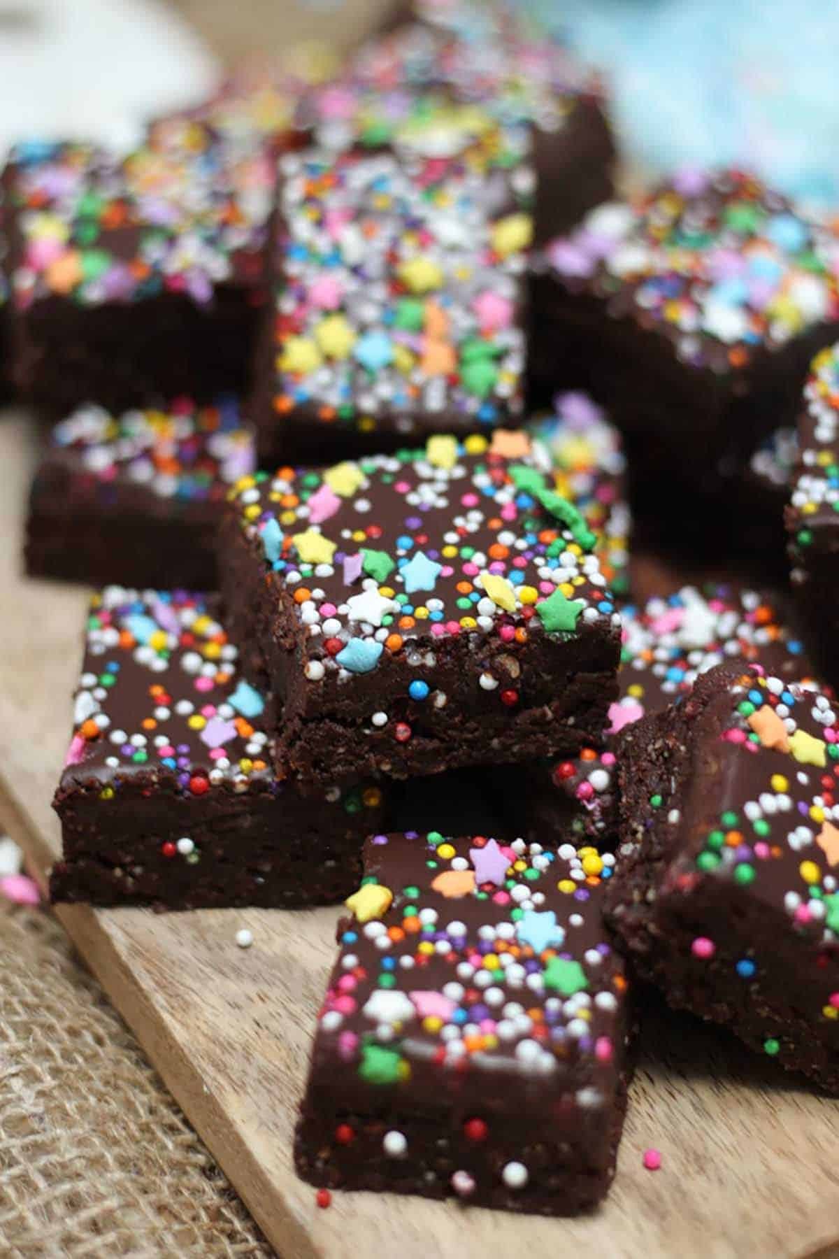 vegan brownies topped with rainbow sprinkles