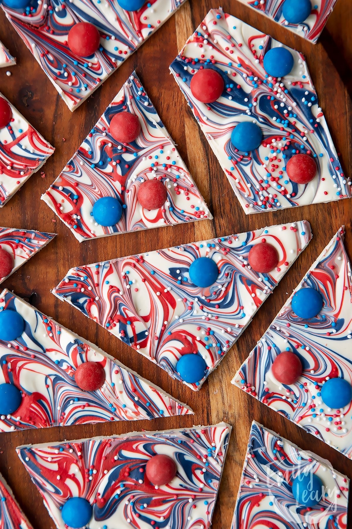 red white and blue chocolate spoons on a parchment paper