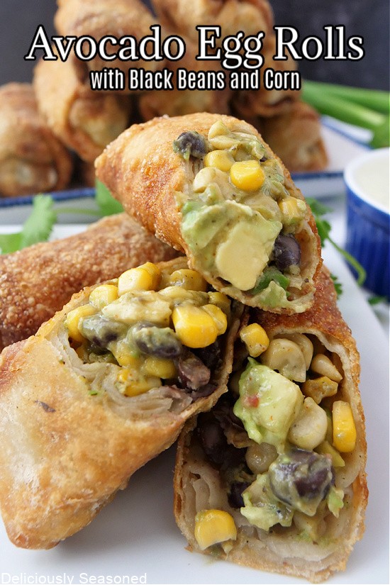 crispy spicy corn and avocado egg rolls on a plate