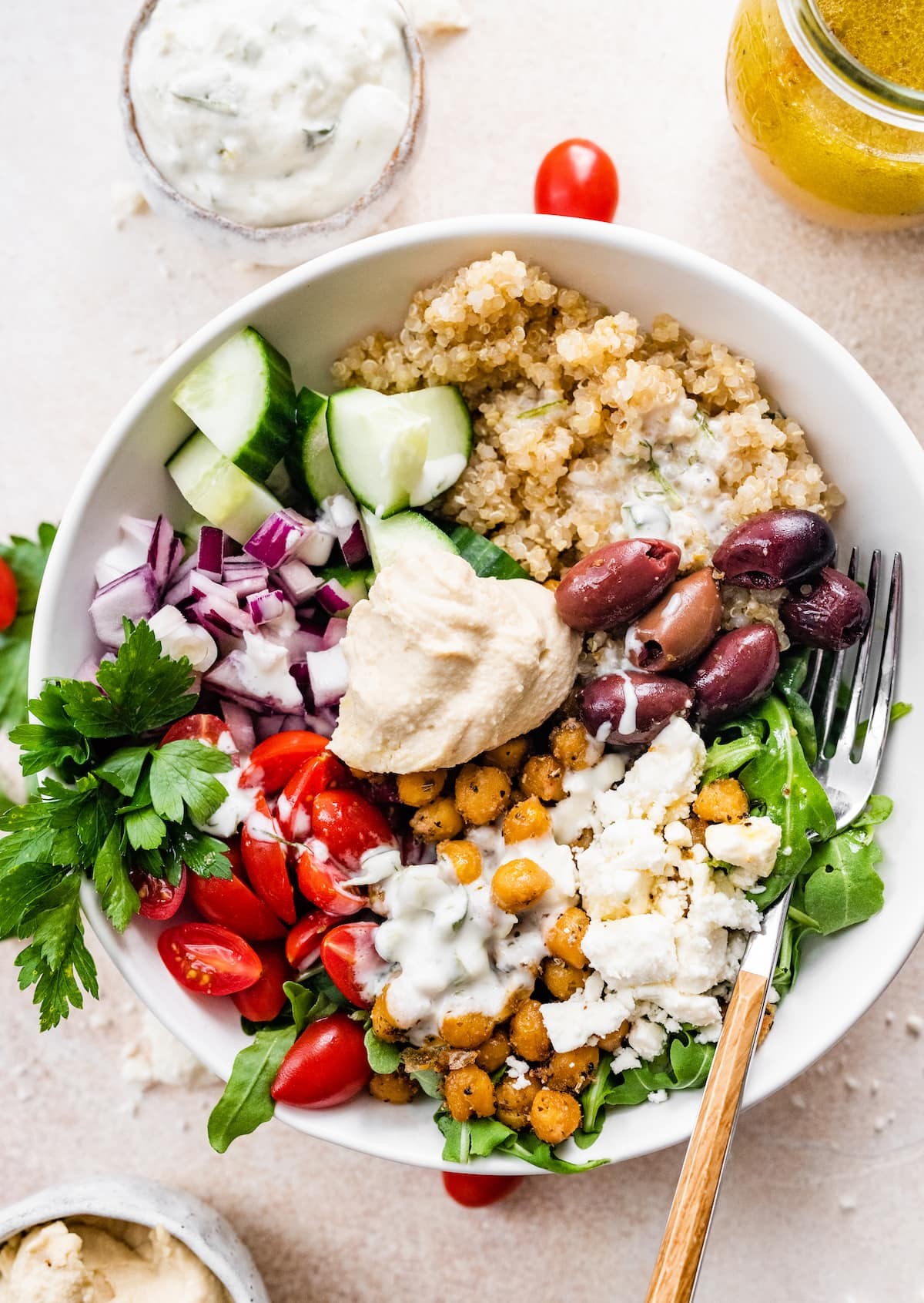 mediterranean quinoa bowl with roasted chickpeas and fresh vegetables