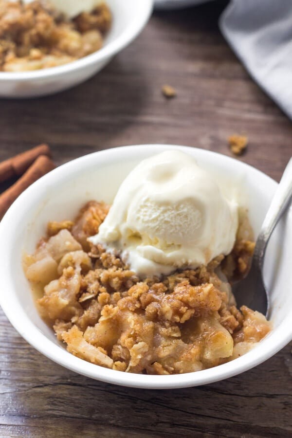 golden brown oatmeal apple crisp with cinnamon sticks