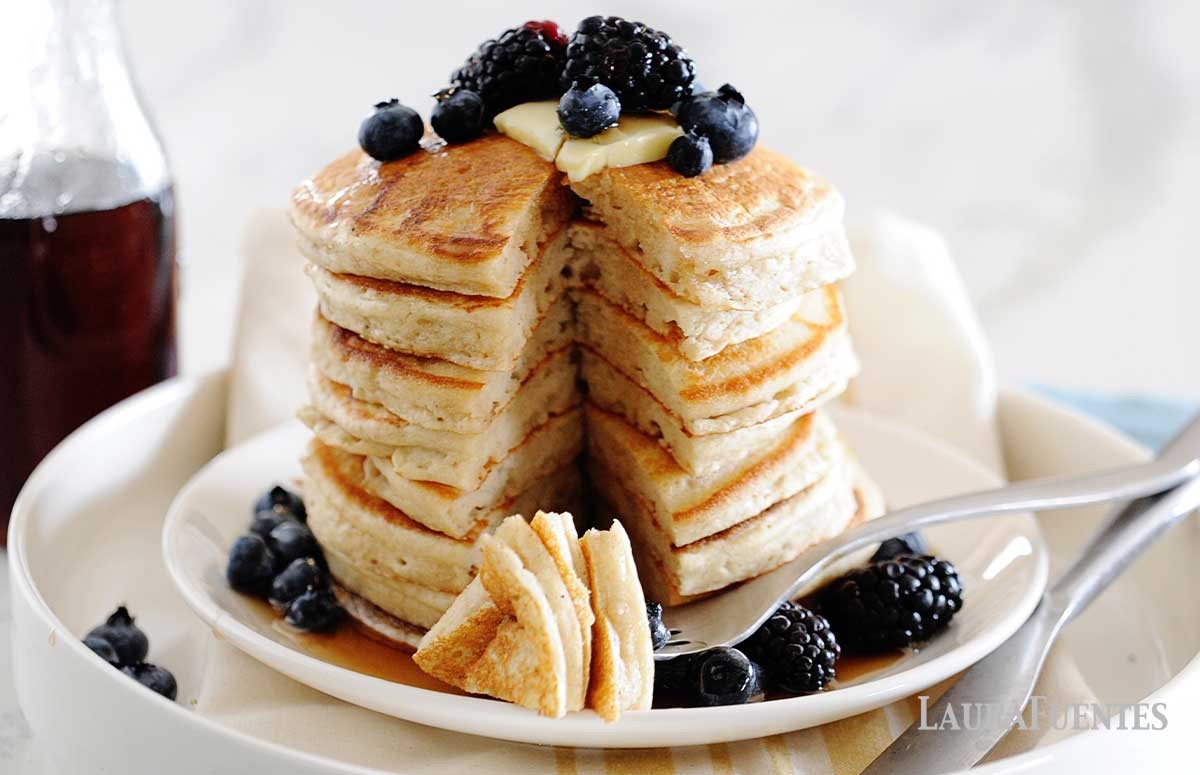 cassava coconut gluten-free pancakes served with fresh fruit and syrup