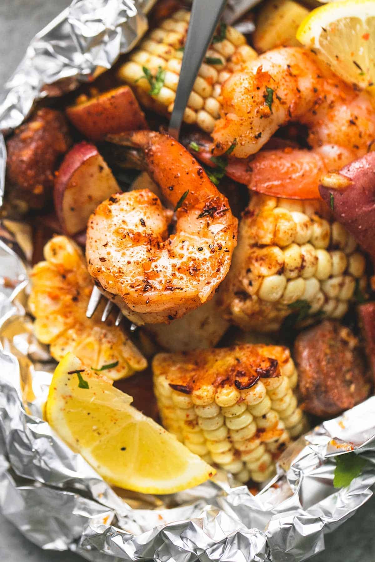 Foil packet shrimp boil with andouille sausage