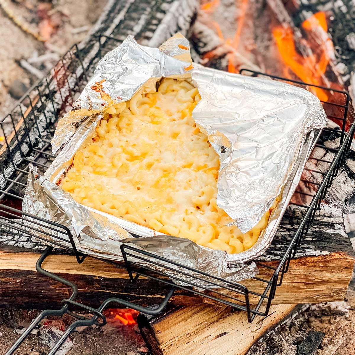 Backcountry Mac and Cheese with Bacon cooked over campfire