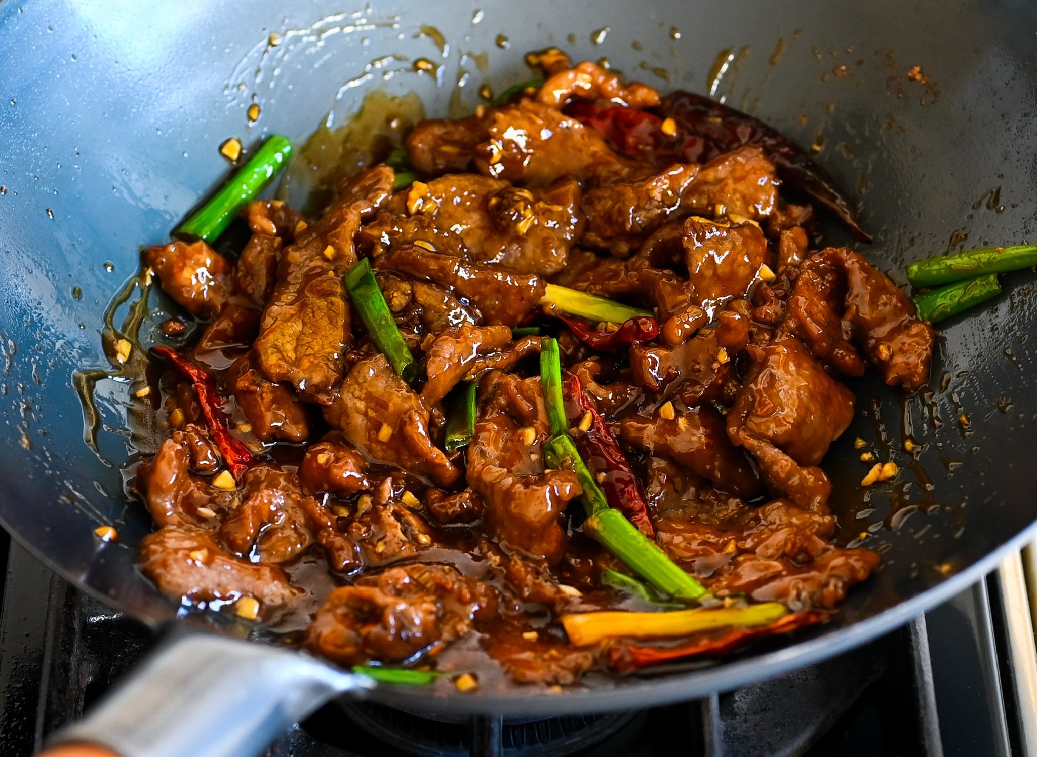 Mongolian beef stir-fry in a wok