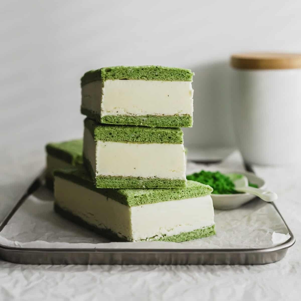 Gyokuro matcha ice cream sandwiches on a wooden board