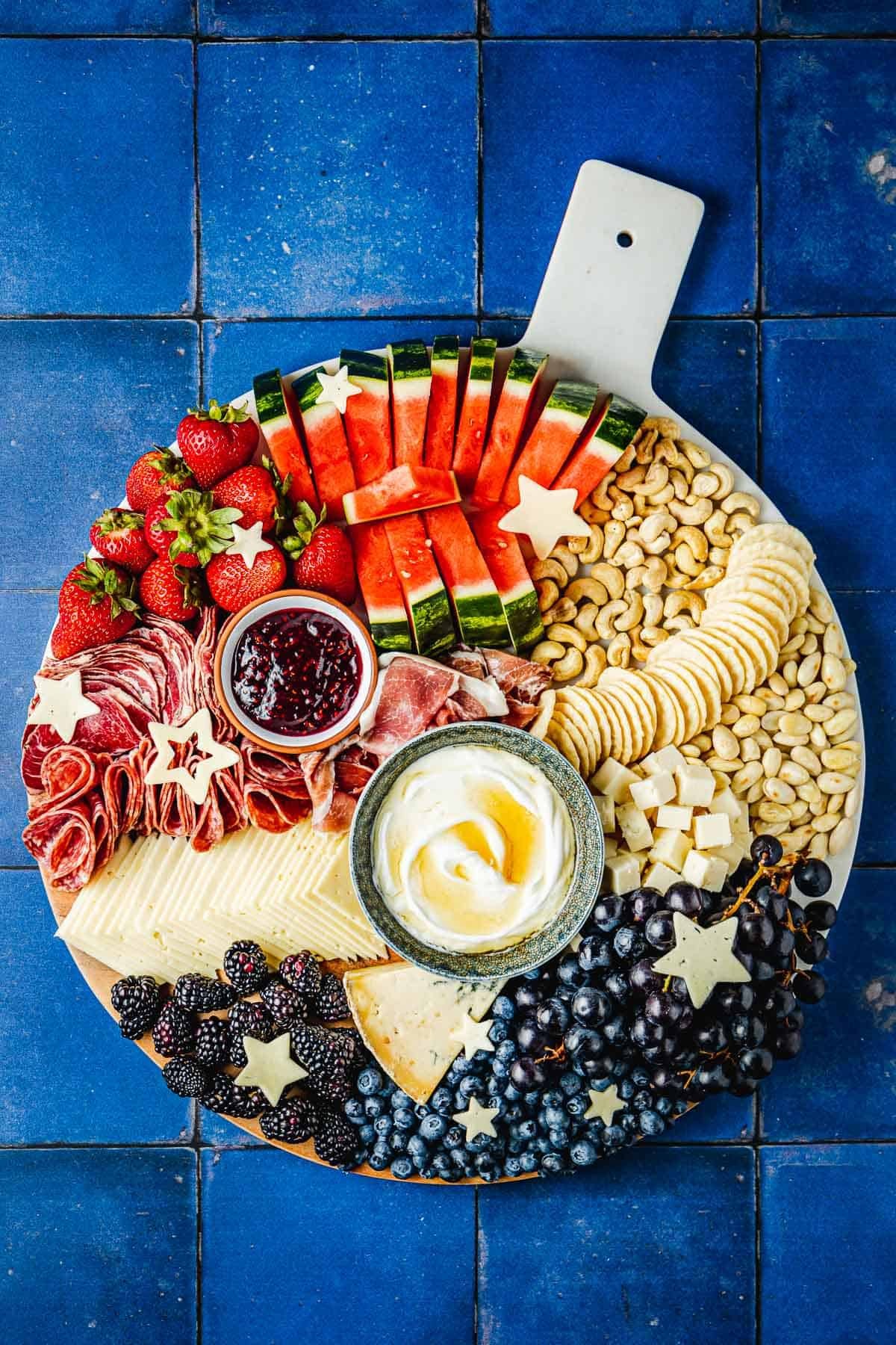 overhead shot of a beautifully arranged Mediterranean charcuterie board