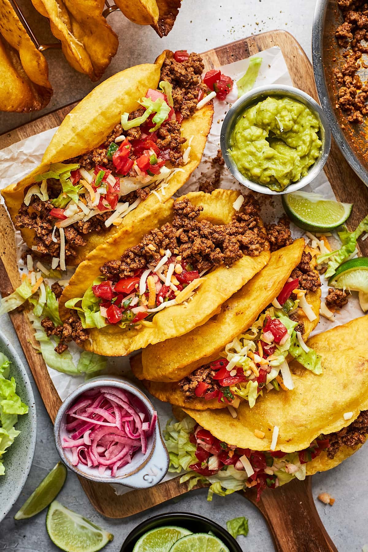 ground beef tacos with various toppings