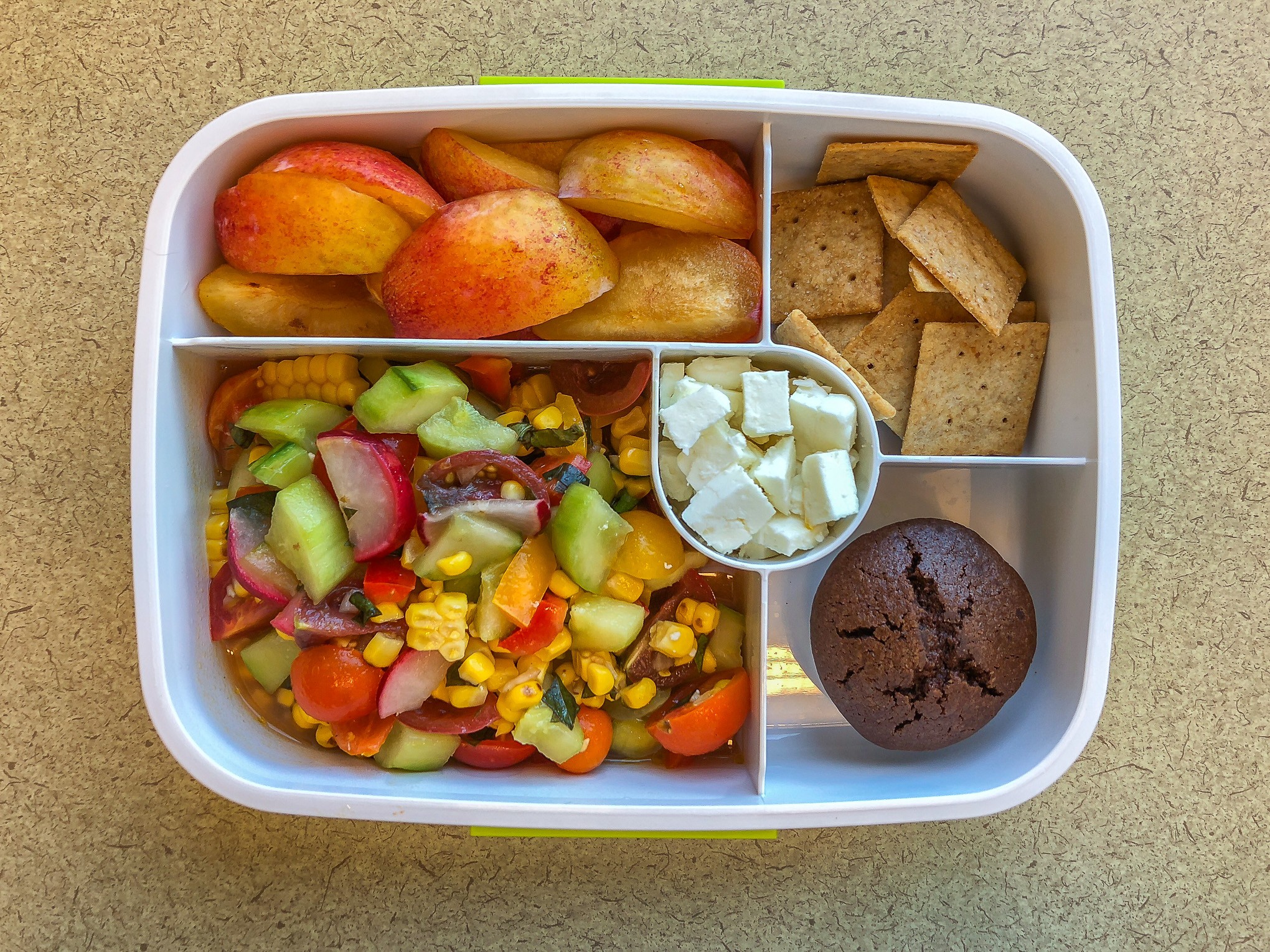 almonds bento box with fruits and vegetables
