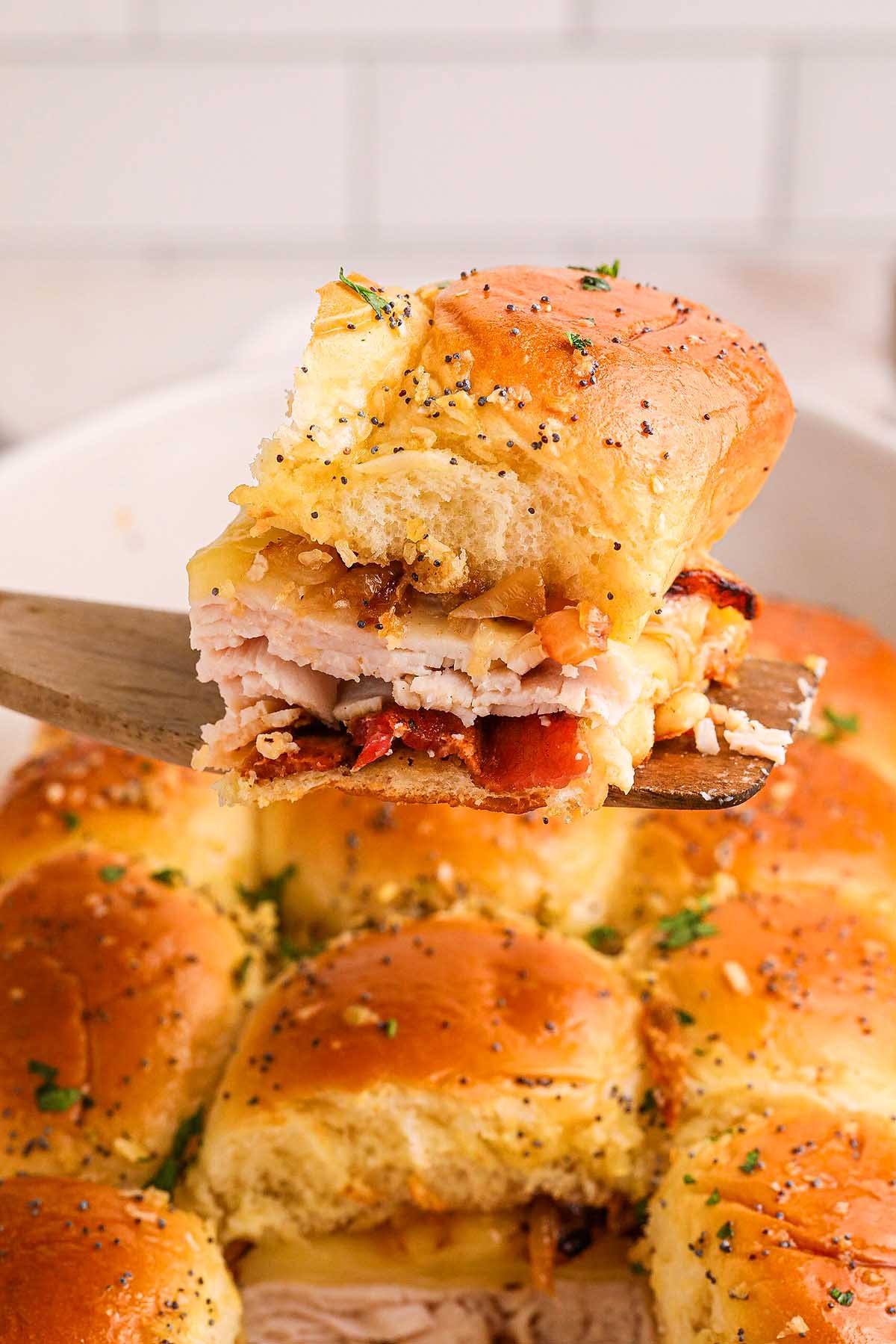 Maple Bourbon BBQ Turkey Sliders on a wooden board