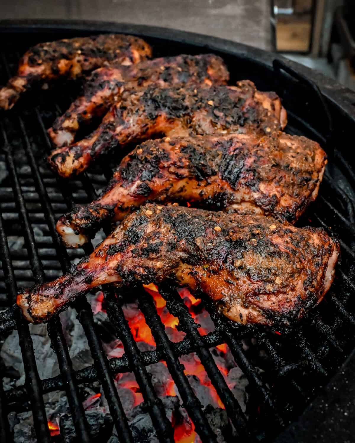 spicy jerk chicken on a grill