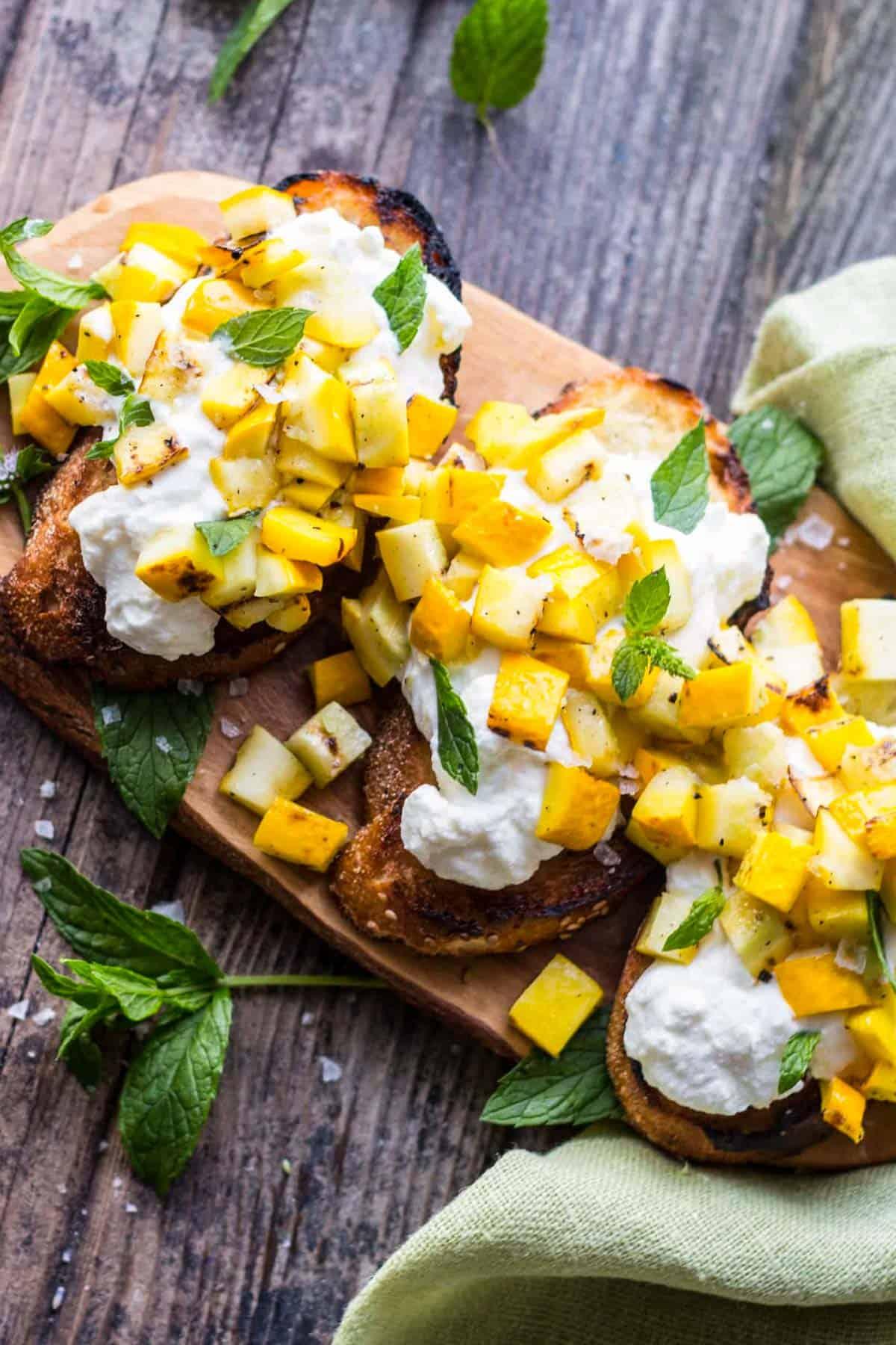 grilled zucchini ricotta crostini served outdoors